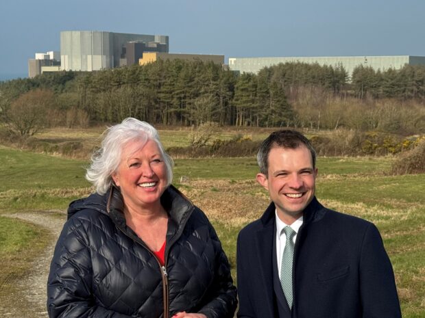 The photo includes Gwen Parry-Jones and Minister Bowie, at Wylfa.